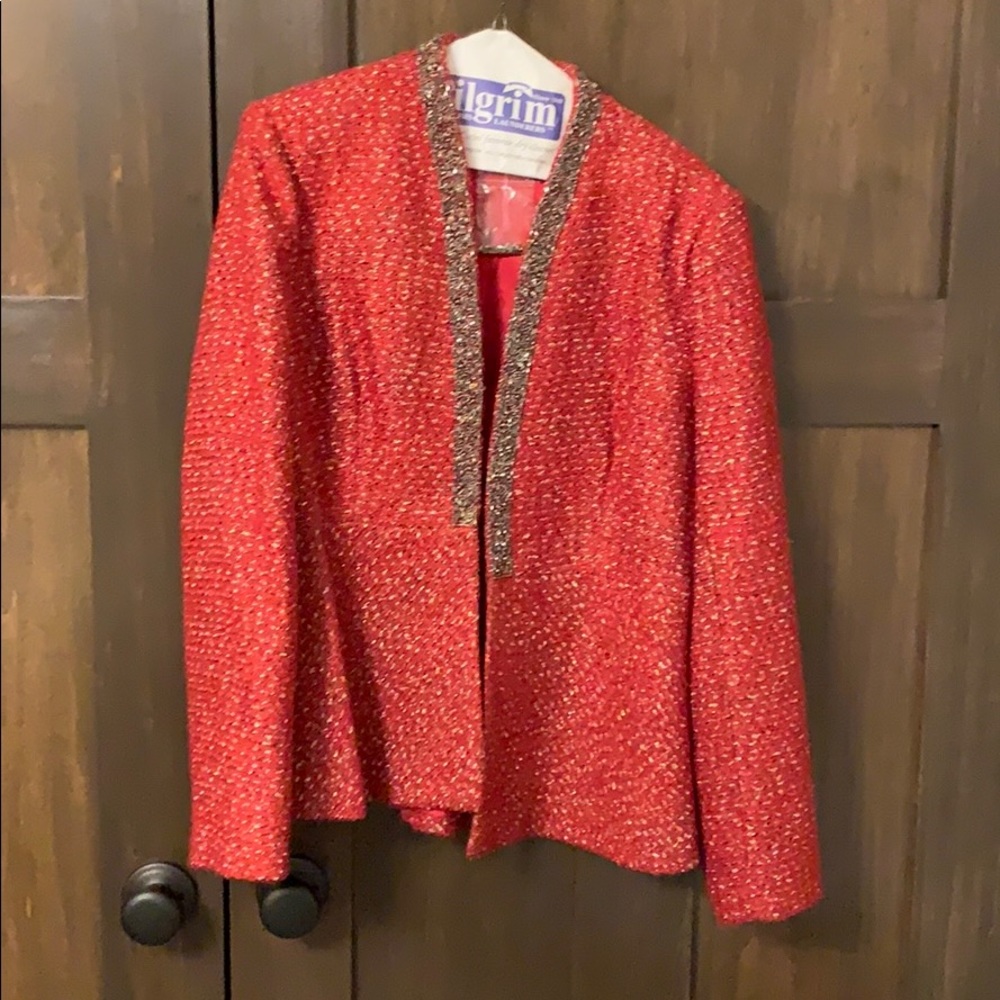 New with tags! Hot red, black and gold jacket.